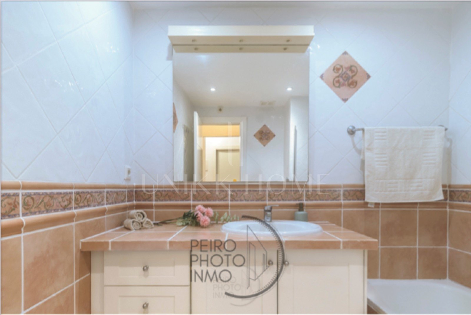 Elegant, bright apartment with large terrace & direct garden access in a tranquil gated community