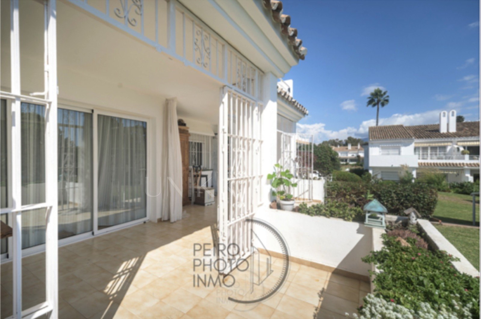 Elegant, bright apartment with large terrace & direct garden access in a tranquil gated community