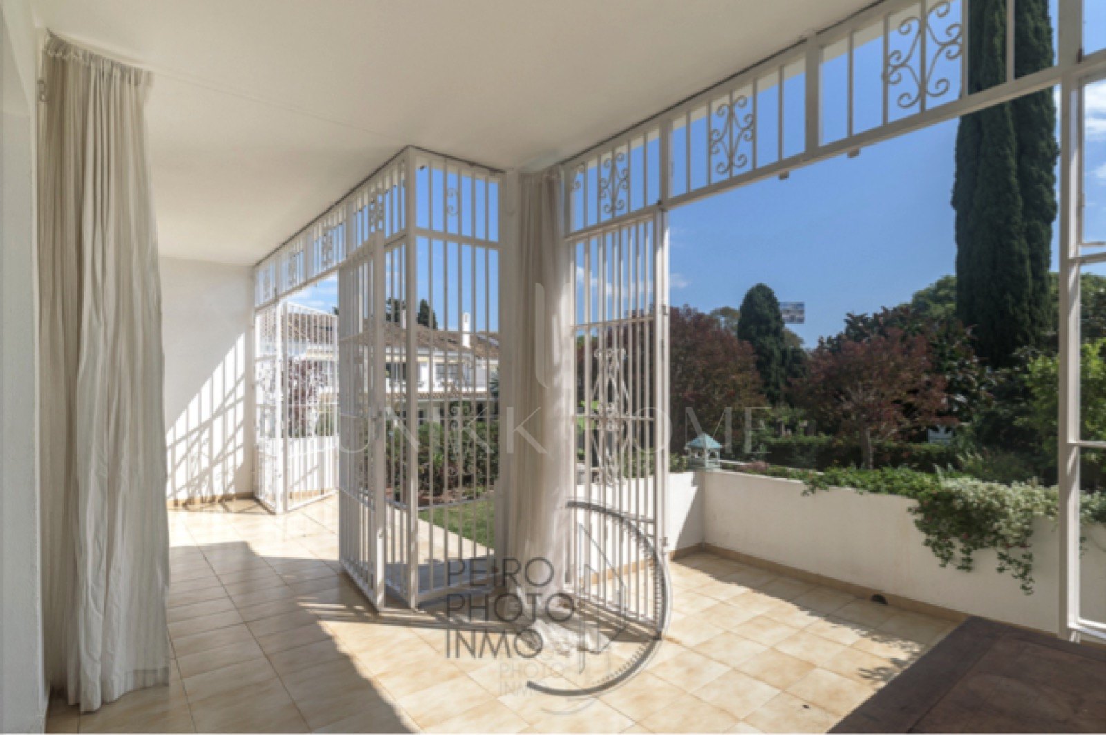 Elegant, bright apartment with large terrace & direct garden access in a tranquil gated community