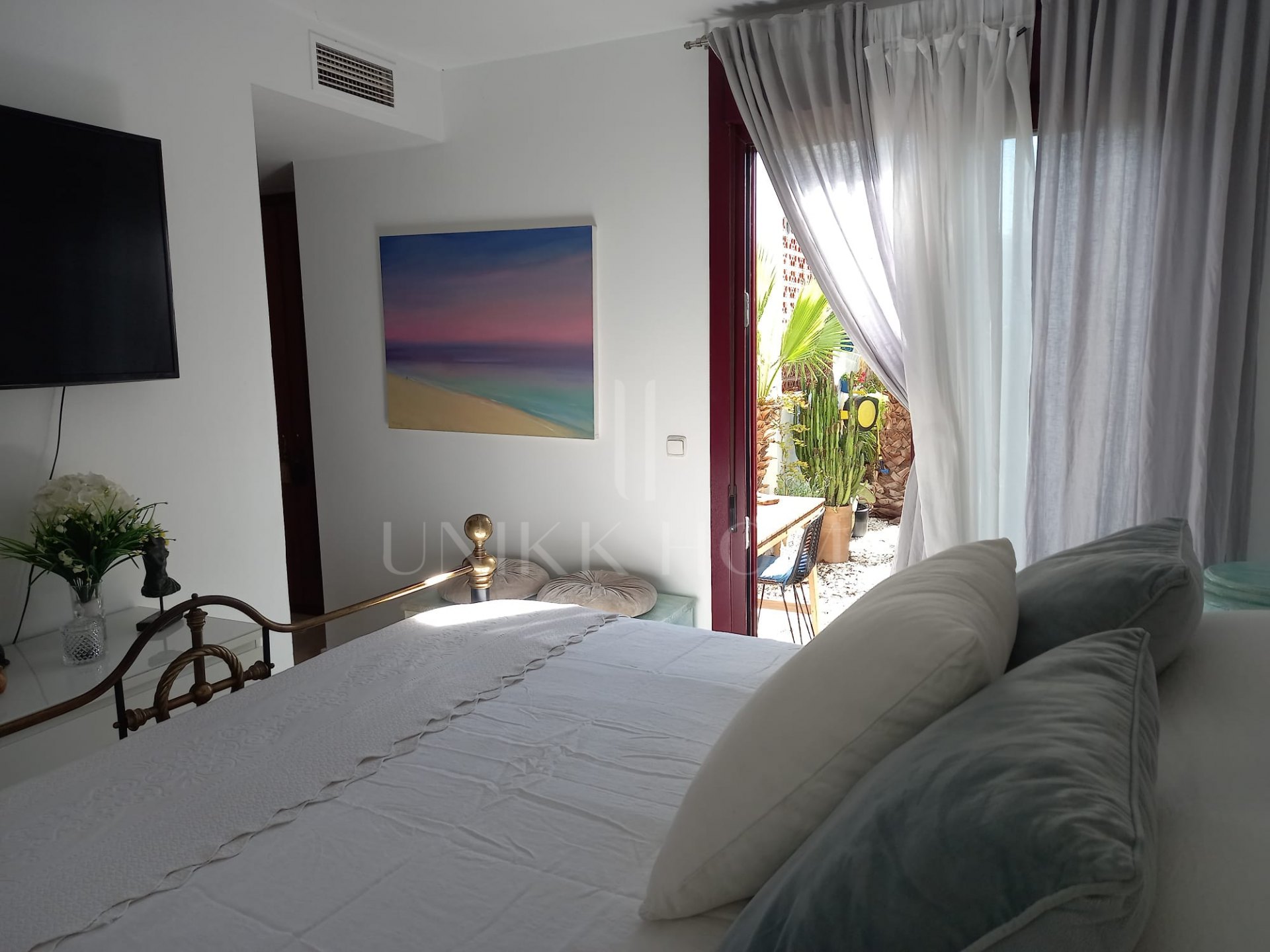 Exclusive Elevated Ground Floor Apartment with Private Garden and South Orientation