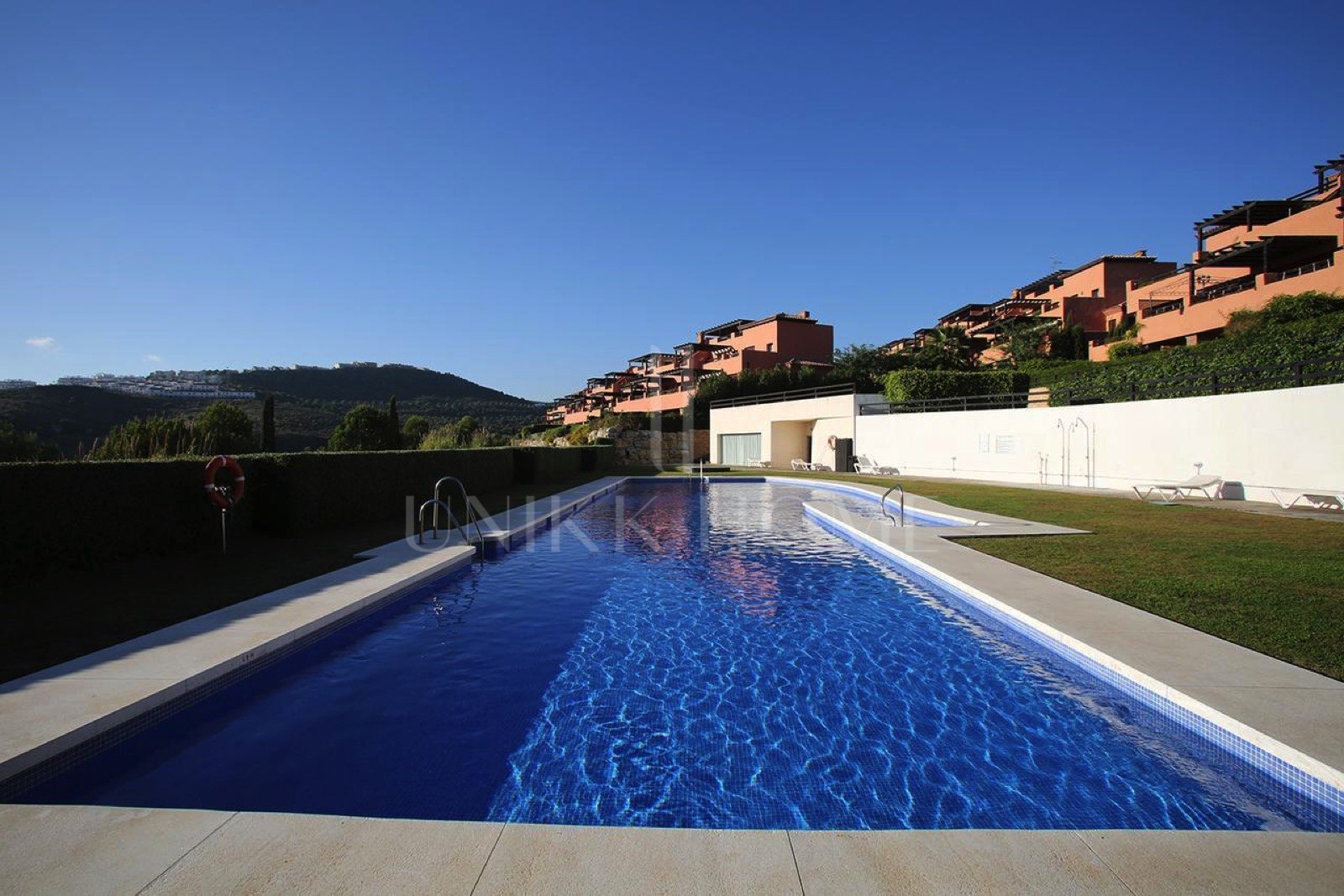 Exclusive Elevated Ground Floor Apartment with Private Garden and South Orientation