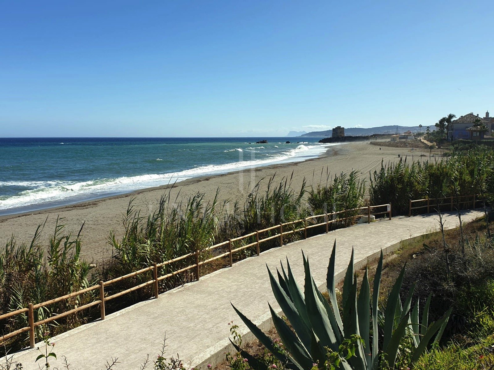 Exclusive South-Facing Beachfront Townhouse with Panoramic Sea Views