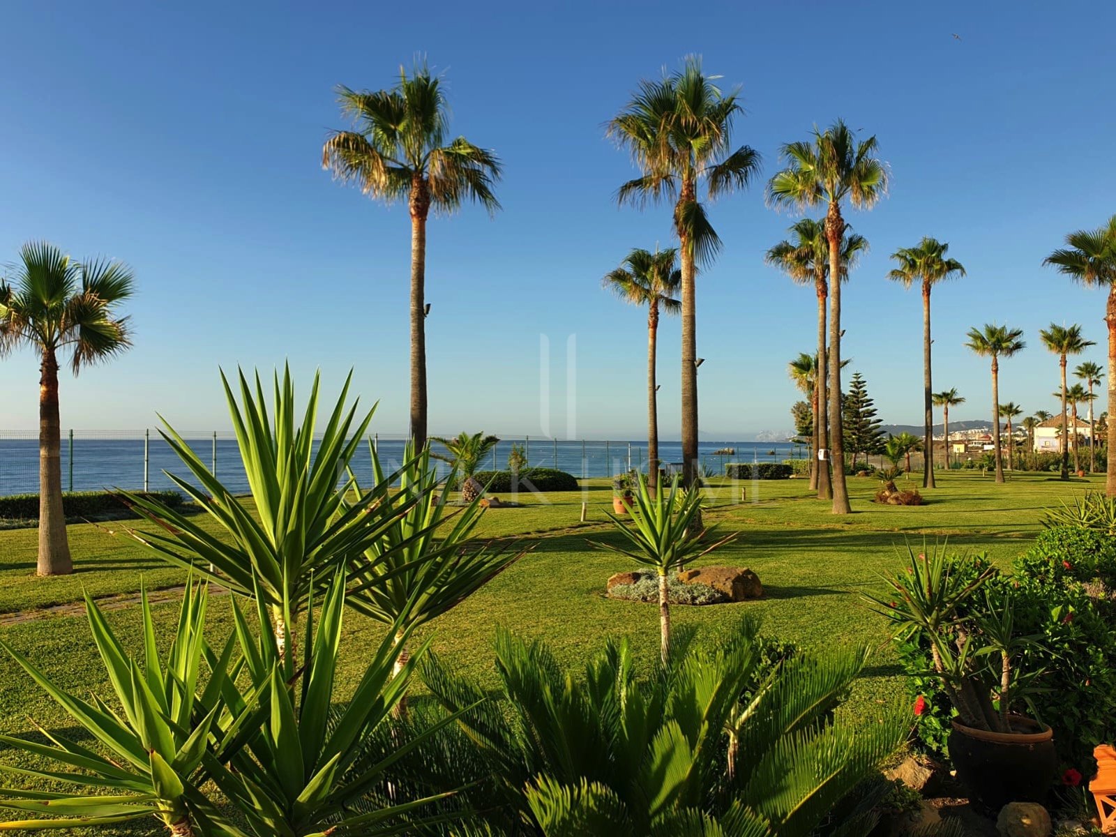 Exclusive South-Facing Beachfront Townhouse with Panoramic Sea Views