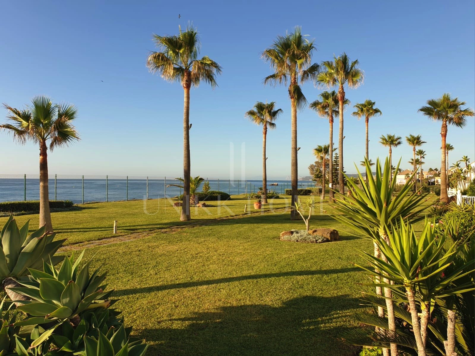 Exclusive South-Facing Beachfront Townhouse with Panoramic Sea Views