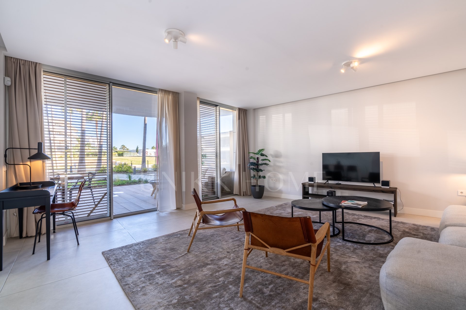 Luxurious beachfront apartment with private garden