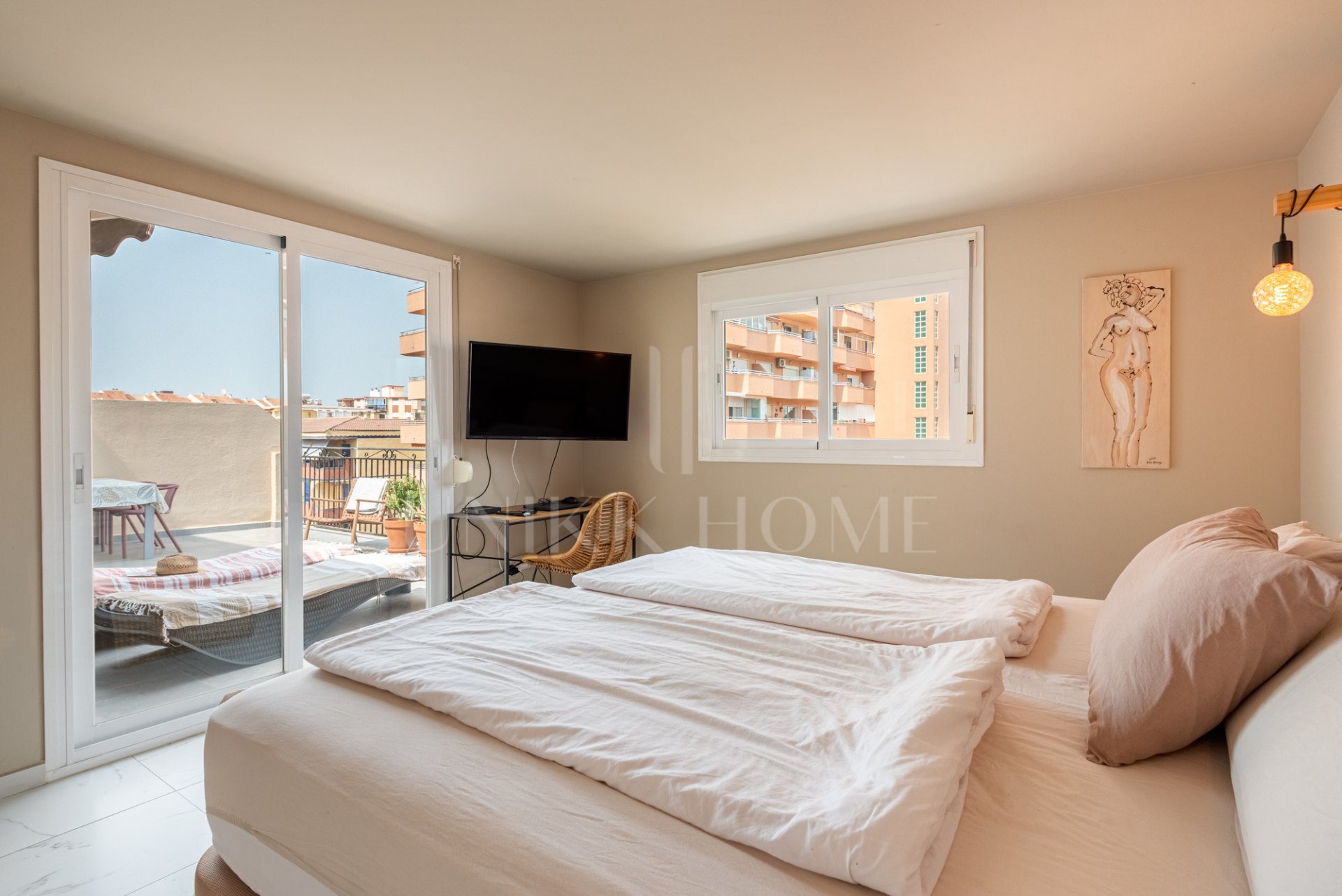 Stylish penthouse with a spacious terrace just steps fro the beach in Los Boliches