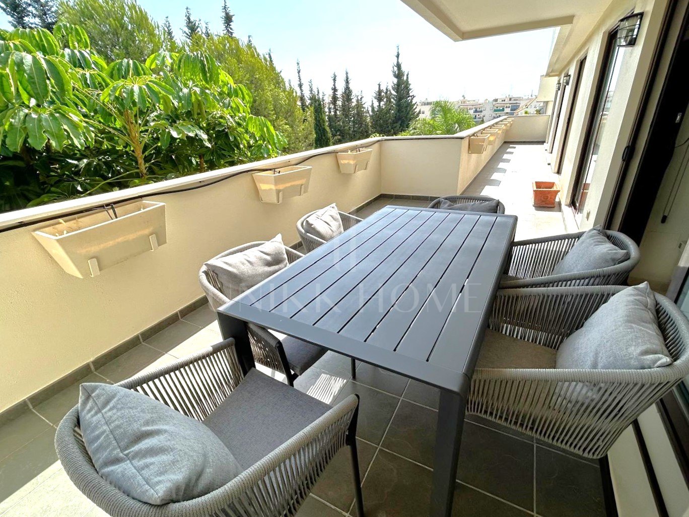 EXCLUSIVE - Three bedroom apartment for sale in the popular Sethome community in Estepona Town.