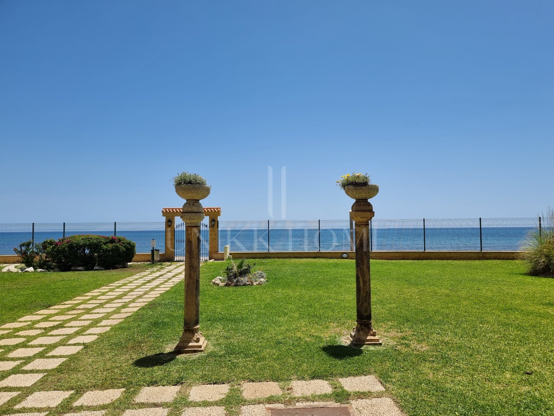 Beachfront Apartment with Stunning Sea Views and Exceptional Investment Potential