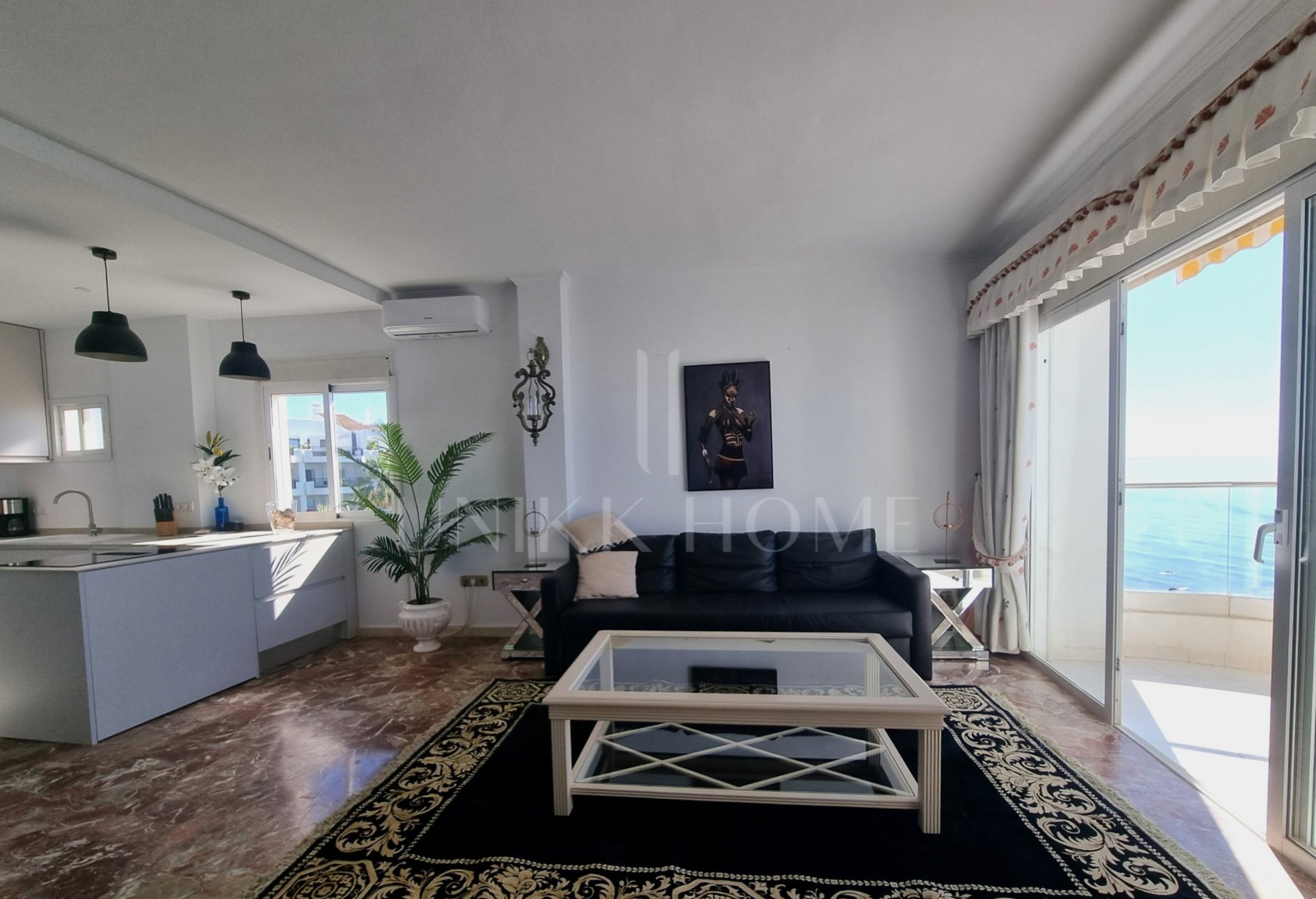 This exclusive 4th-floor apartment is a true coastal sanctuary, offering uninterrupted sea views and direct access to pristine beaches and lush communal gardens.