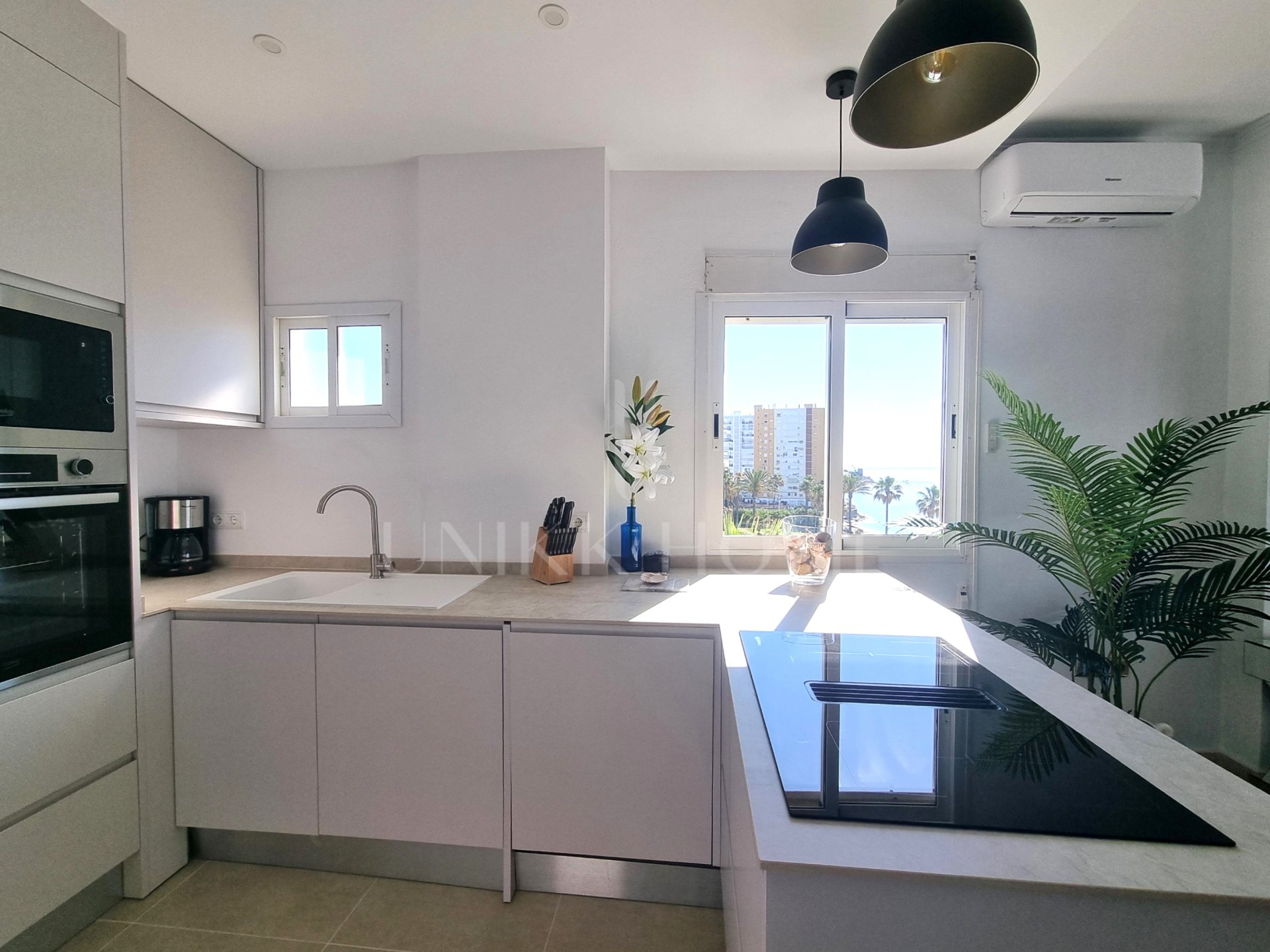 This exclusive 4th-floor apartment is a true coastal sanctuary, offering uninterrupted sea views and direct access to pristine beaches and lush communal gardens.