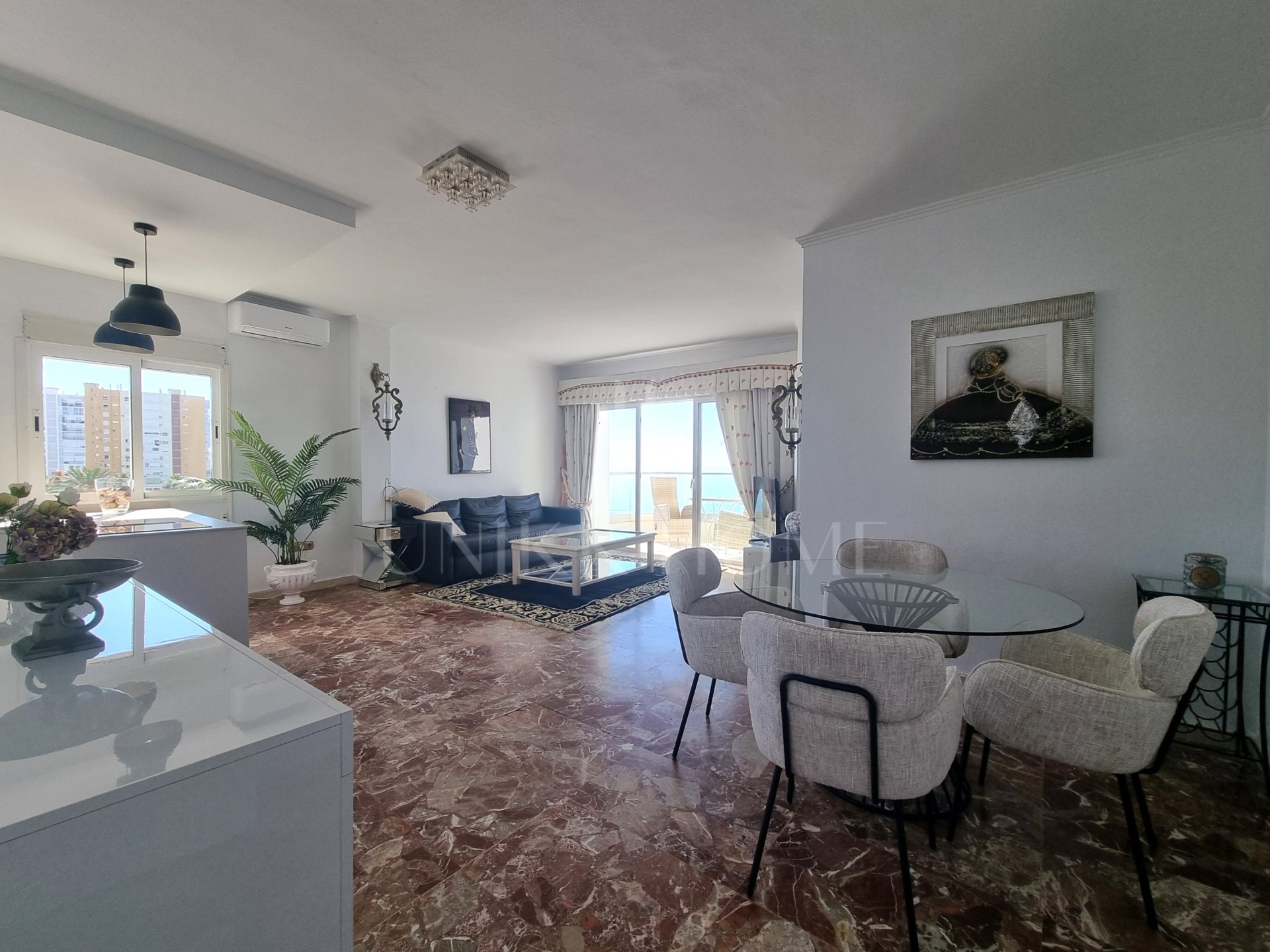 This exclusive 4th-floor apartment is a true coastal sanctuary, offering uninterrupted sea views and direct access to pristine beaches and lush communal gardens.
