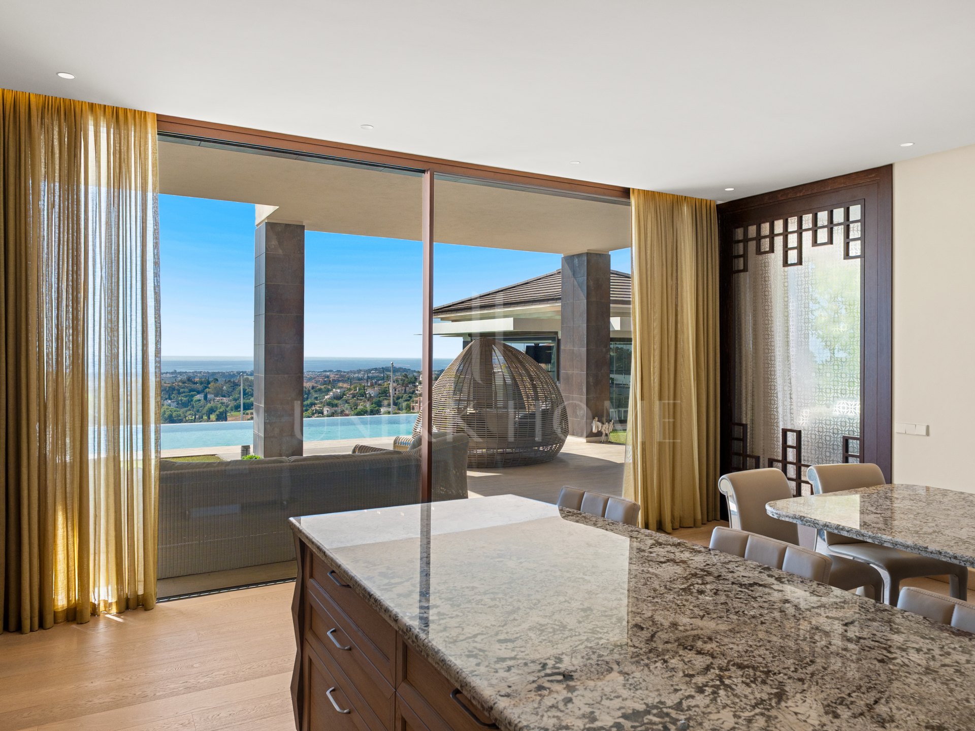 Stylish and modern luxury villa with panoramic sea views in La Reserva del Alcuzcuz, Benahavis