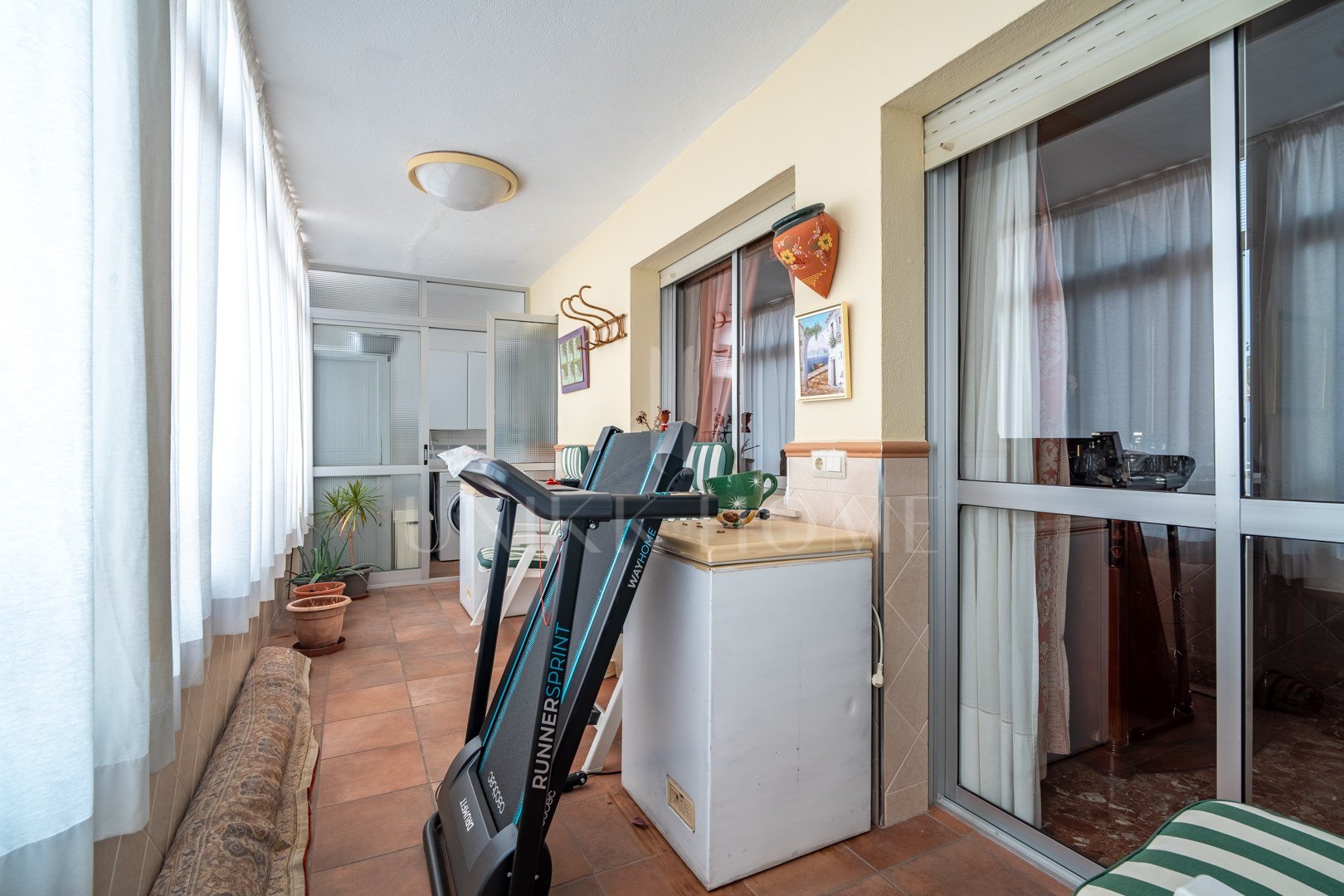 Spacious Apartment with Garage and Terraces Near Málaga Historic Centre