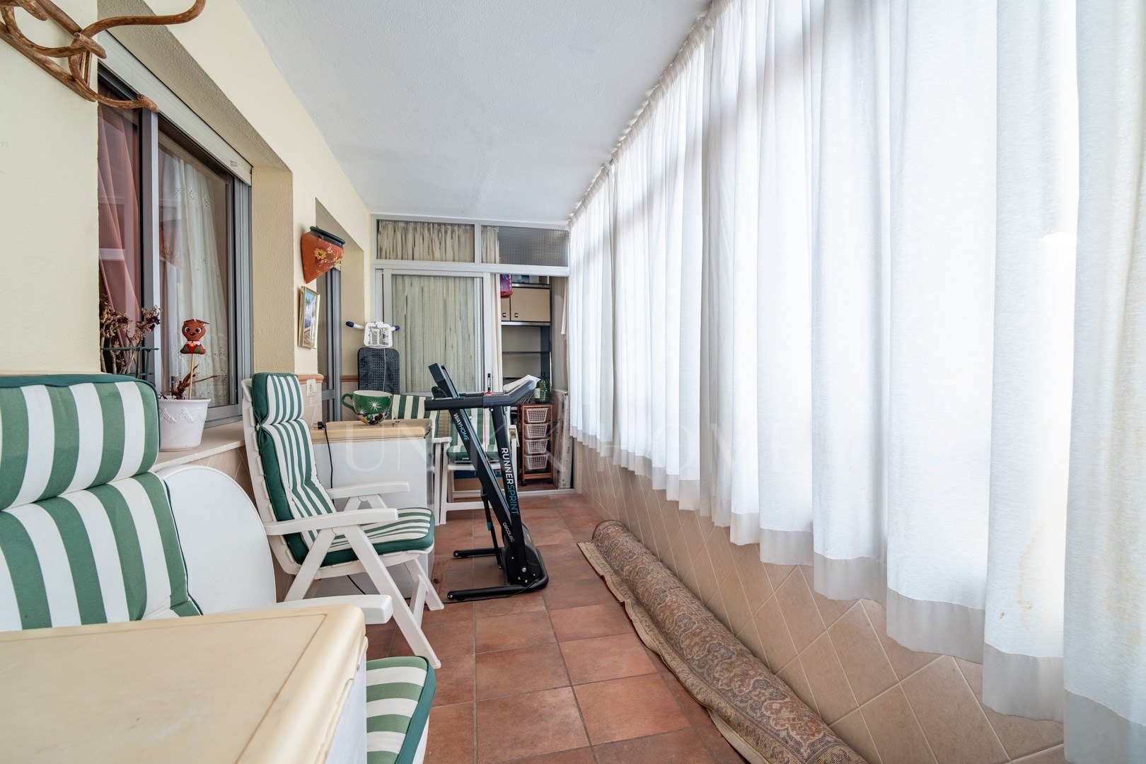 Spacious Apartment with Garage and Terraces Near Málaga Historic Centre