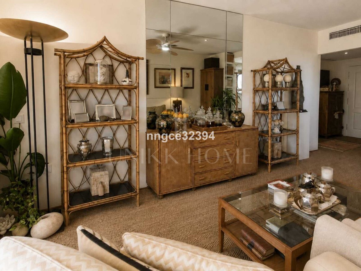 Top-Floor Designer Apartment on Marbella's Golden Mile | Sea Views, Terrace, Garage & Storage