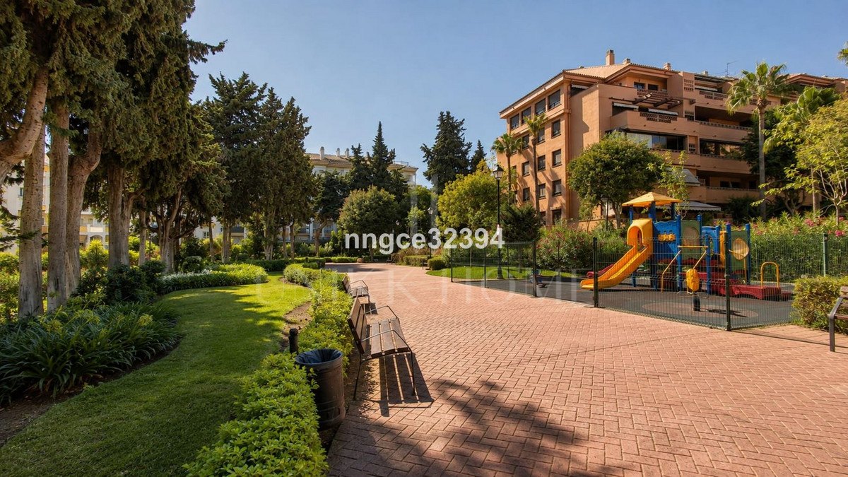 Top-Floor Designer Apartment on Marbella's Golden Mile | Sea Views, Terrace, Garage & Storage