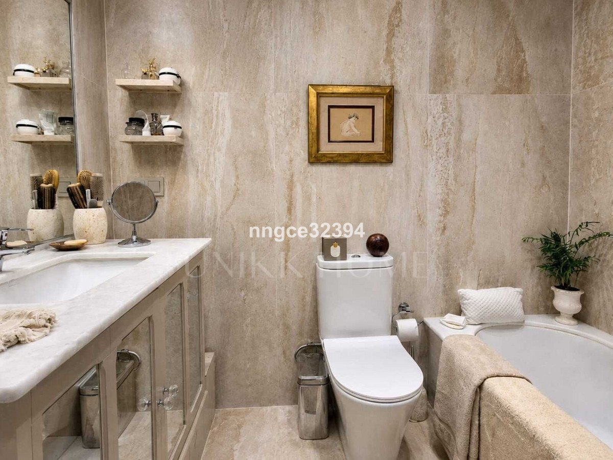 Top-Floor Designer Apartment on Marbella's Golden Mile | Sea Views, Terrace, Garage & Storage