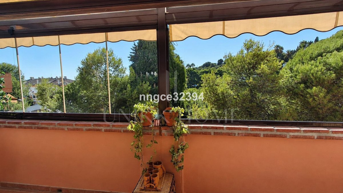 Top-Floor Designer Apartment on Marbella's Golden Mile | Sea Views, Terrace, Garage & Storage
