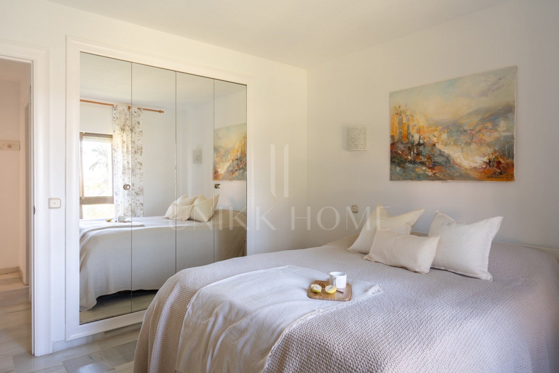 First-line beach home with sea views