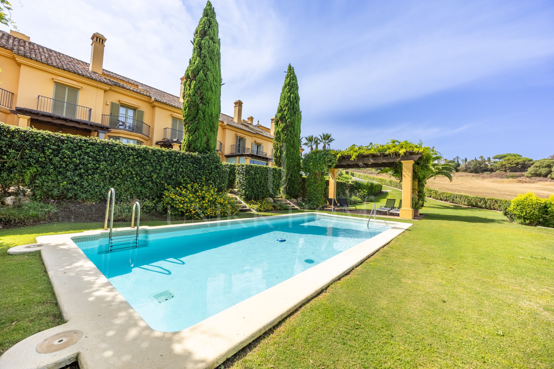 Exclusive Semi-Detached House with 4 bedrooms on the Frontline of Golf in Sotogrande – with Private Garden