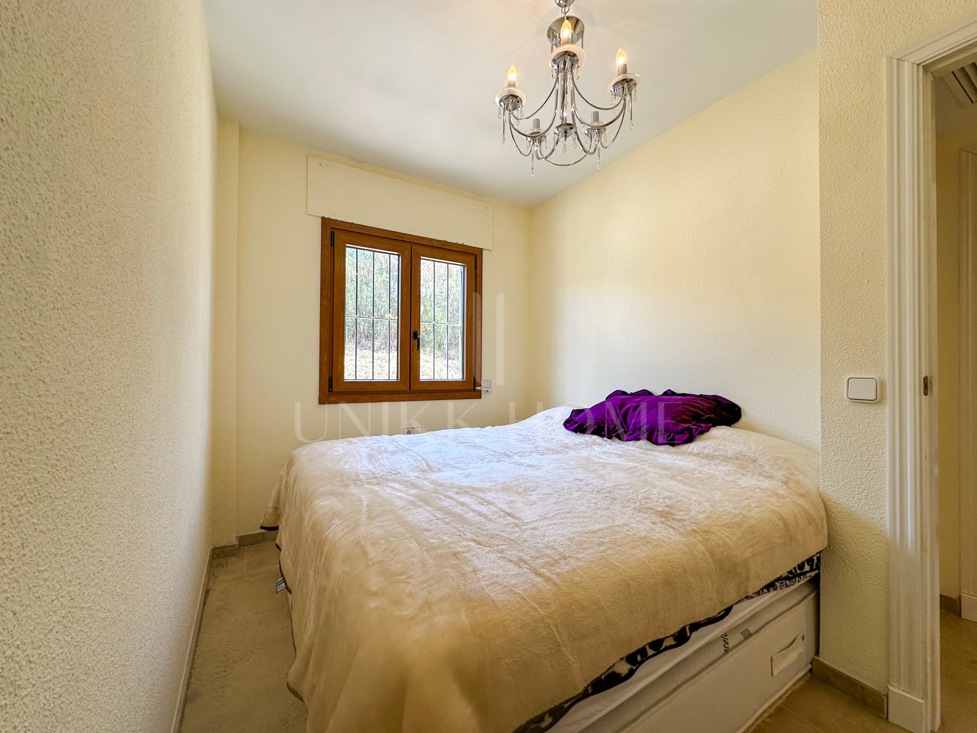 Semi detached house in Puerto La Duquesa with a sun terrace, sea views and a private garage for just €375,000