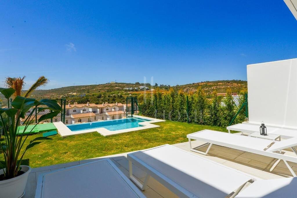 Semi-Detached Villa with Panoramic Sea and Gibraltar Views on the Costa del Sol