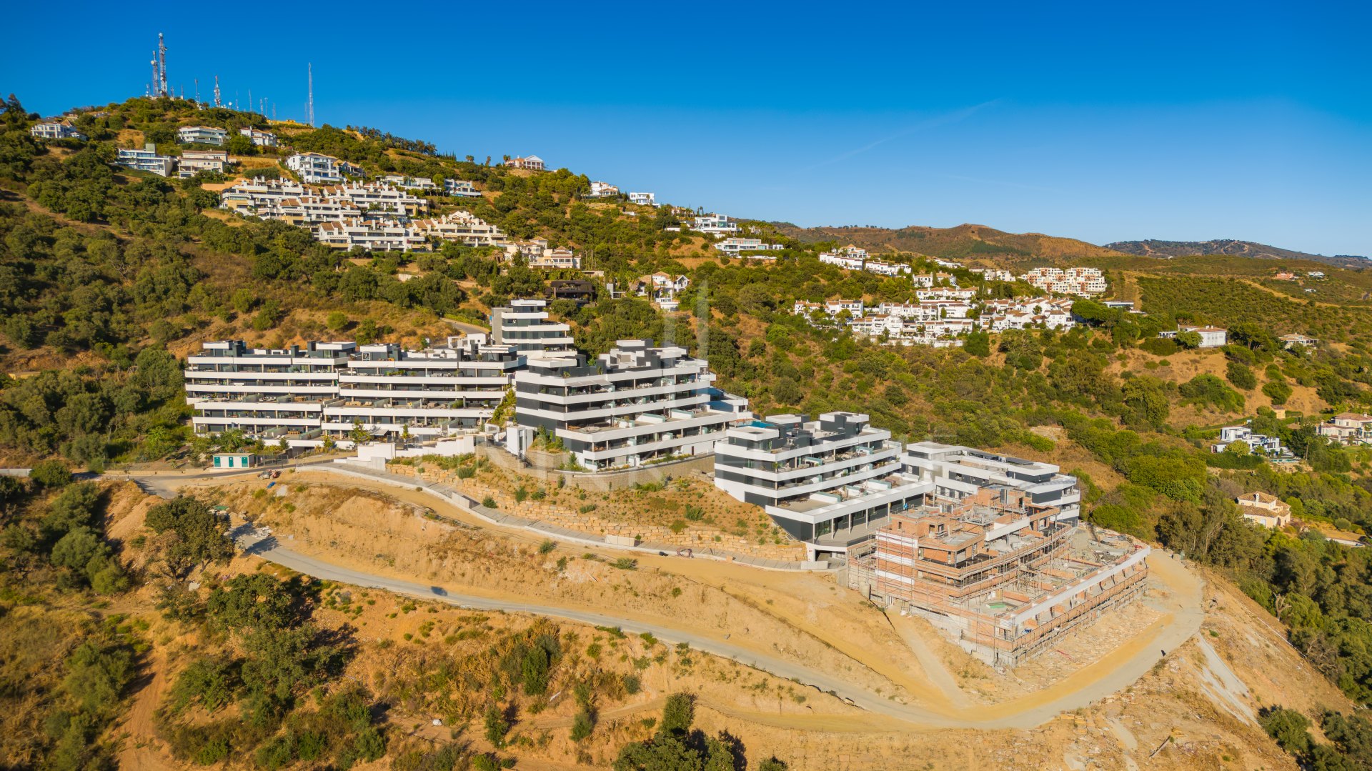 Beautifully designed, two-bedroom ground-floor apartment located in the sought-after Medblue community of Altos de Los Monteros, Marbella