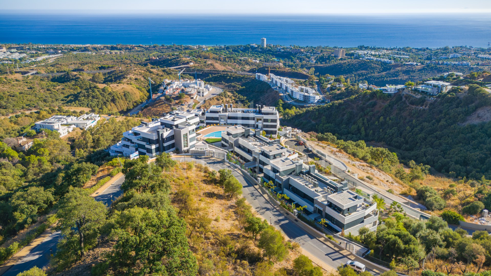 Beautifully designed, two-bedroom ground-floor apartment located in the sought-after Medblue community of Altos de Los Monteros, Marbella