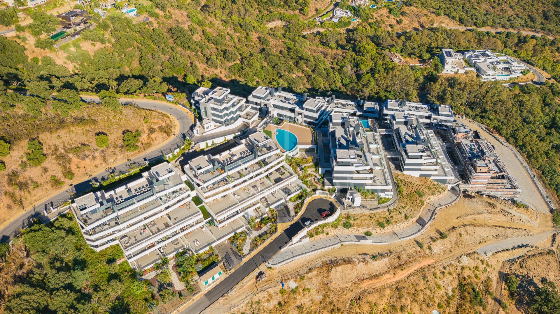 Beautifully designed, two-bedroom ground-floor apartment located in the sought-after Medblue community of Altos de Los Monteros, Marbella