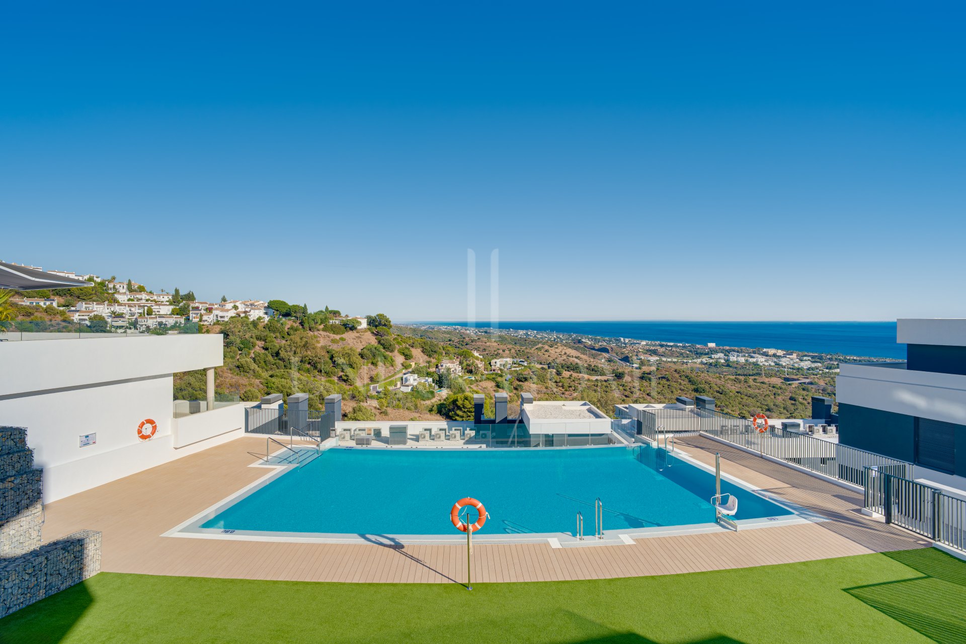 Beautifully designed, two-bedroom ground-floor apartment located in the sought-after Medblue community of Altos de Los Monteros, Marbella