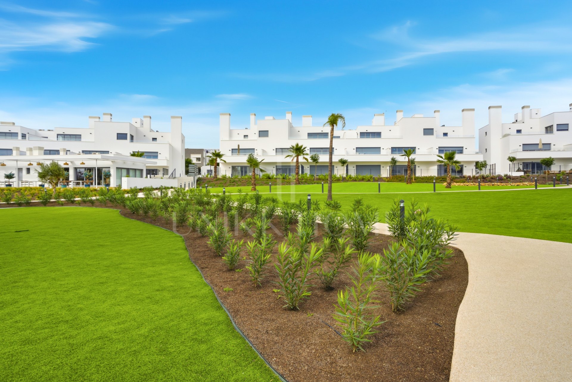 Stylish, southwest facing two bedroom apartment located in the sought-after gated community Acqua Gardens on the New Golden Mile, Estepona