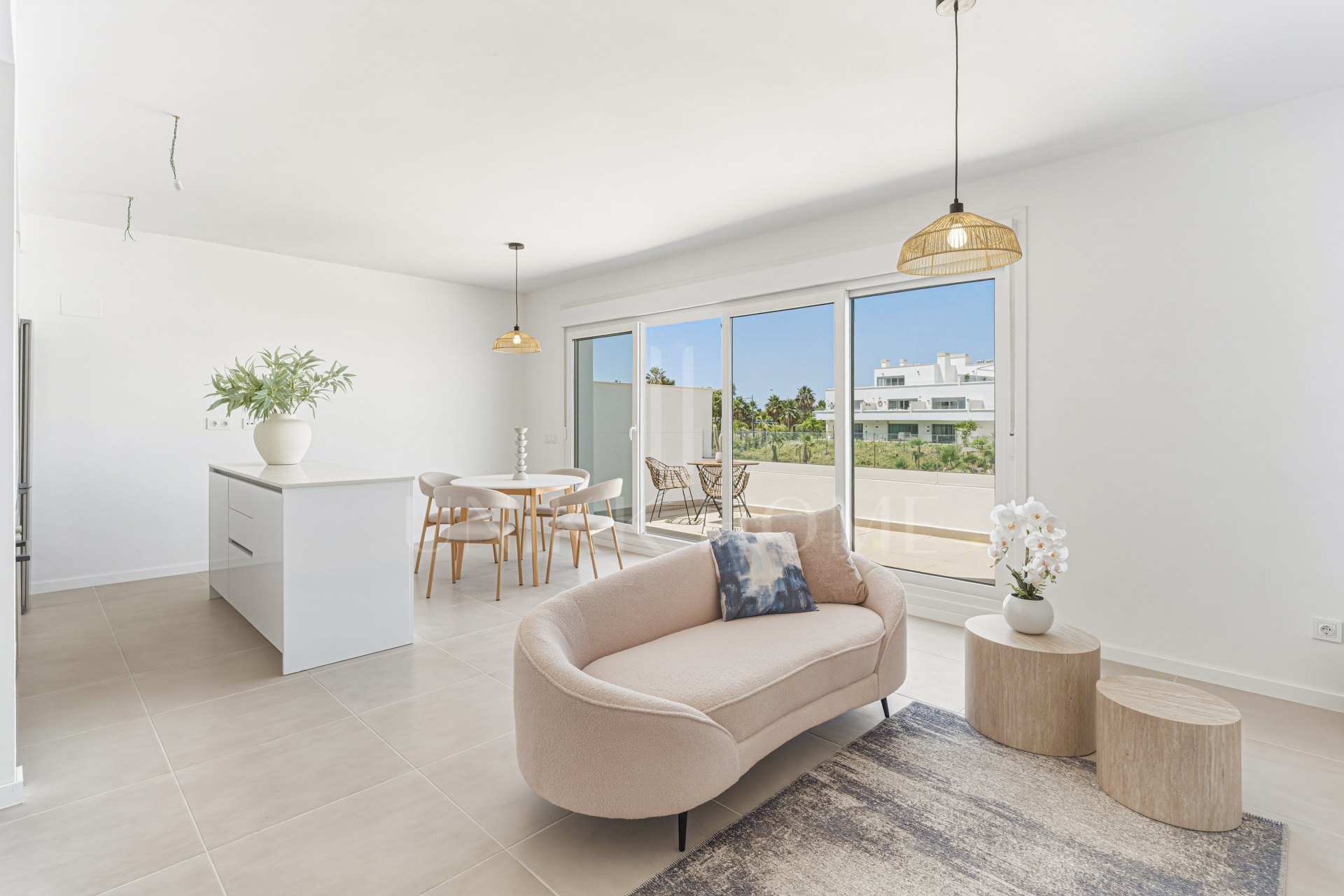 Stylish, southwest facing two bedroom apartment located in the sought-after gated community Aqua Gardens on the New Golden Mile, Estepona