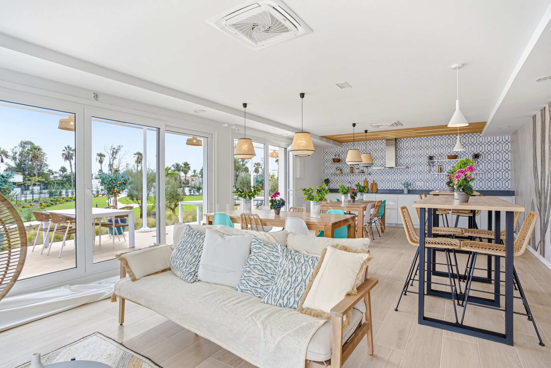 Stylish, southwest facing two bedroom apartment located in the sought-after gated community Acqua Gardens on the New Golden Mile, Estepona