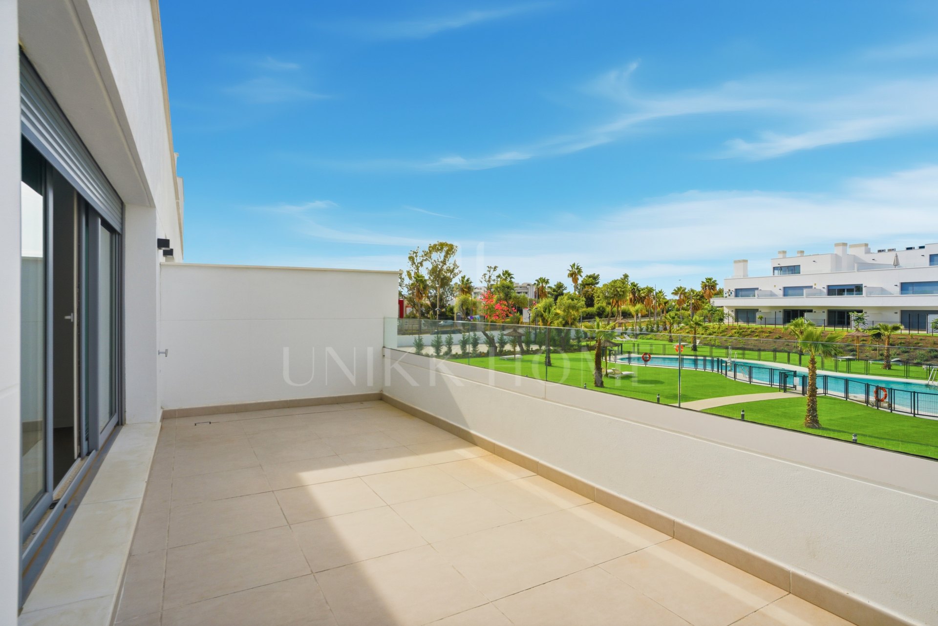Stylish, southwest facing two bedroom apartment located in the sought-after gated community Acqua Gardens on the New Golden Mile, Estepona