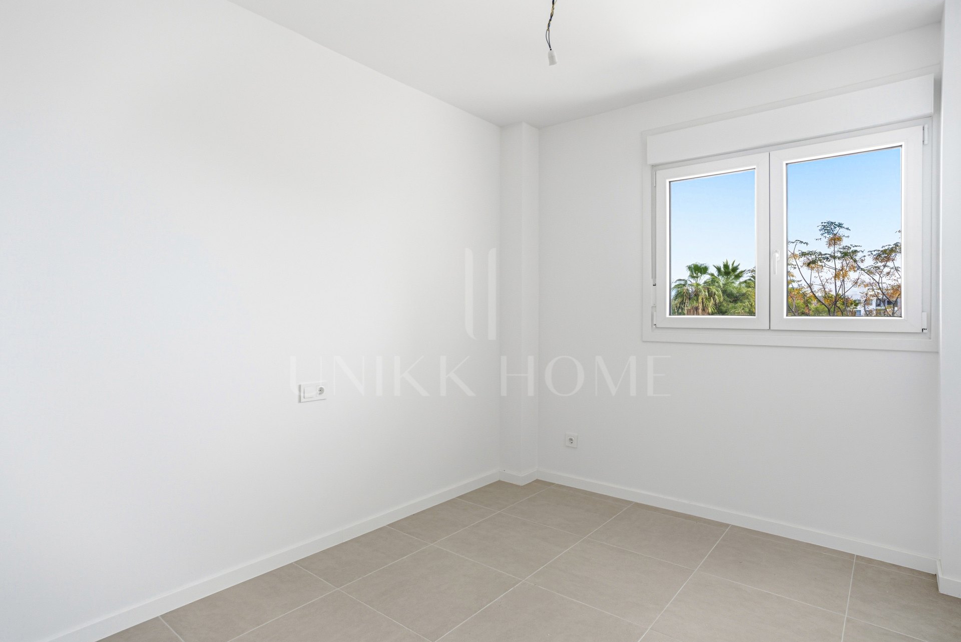 Stylish, southwest facing two bedroom apartment located in the sought-after gated community Aqua Gardens on the New Golden Mile, Estepona