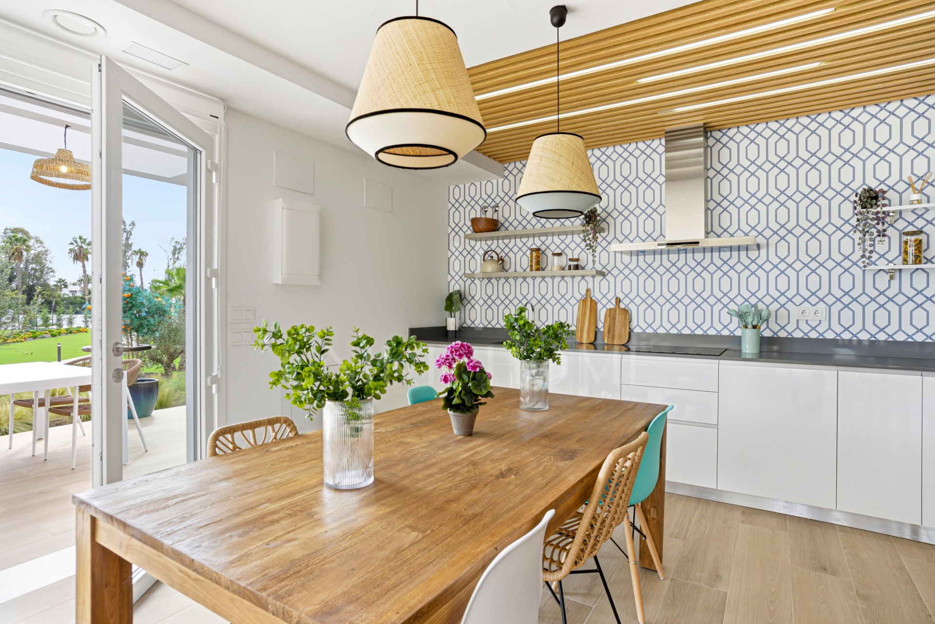 Stylish, southwest facing two bedroom apartment located in the sought-after gated community Acqua Gardens on the New Golden Mile, Estepona