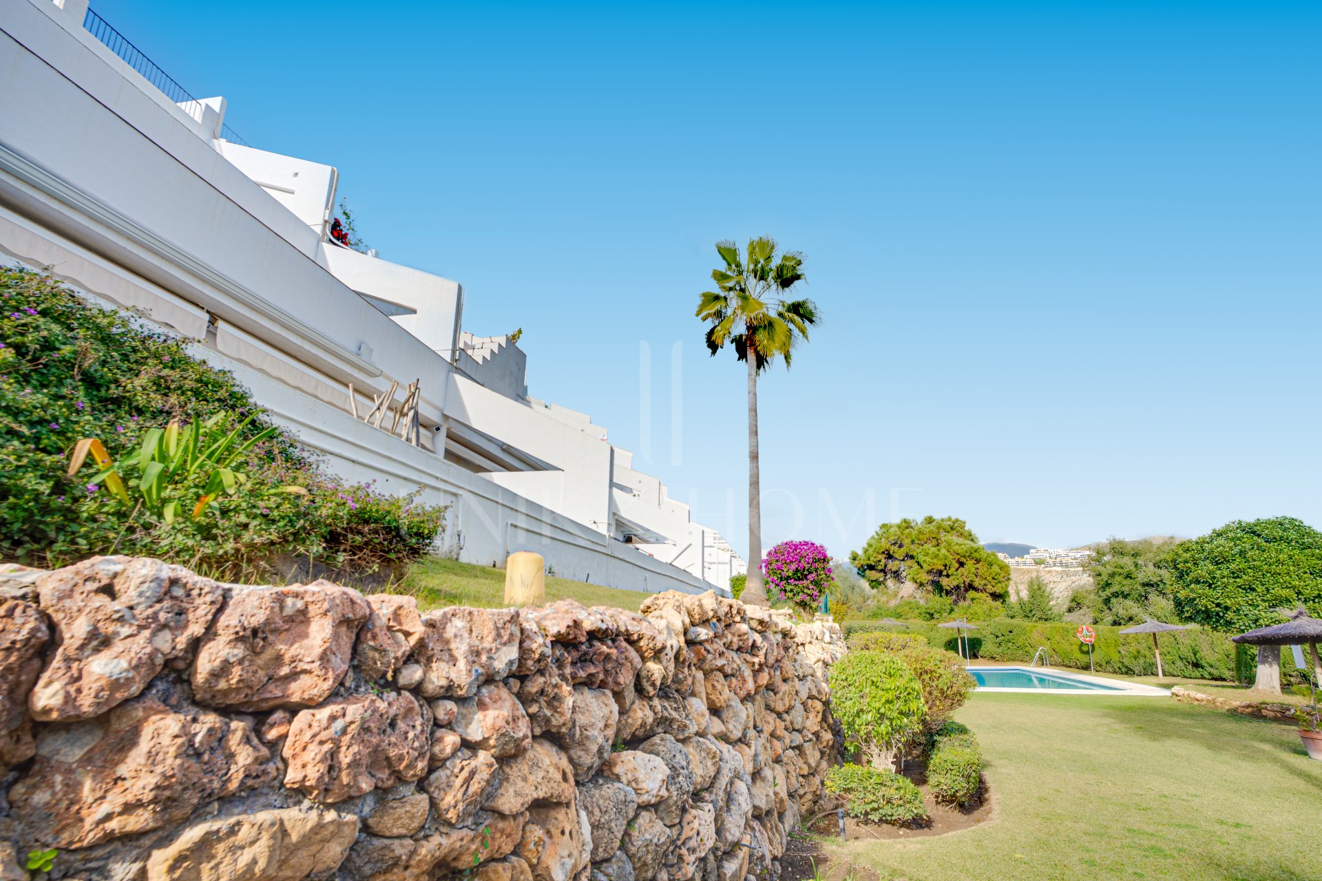 Impeccably refurbished, elevated south east facing ground-floor apartment located in the prestigious La Quinta Golf, Benahavis