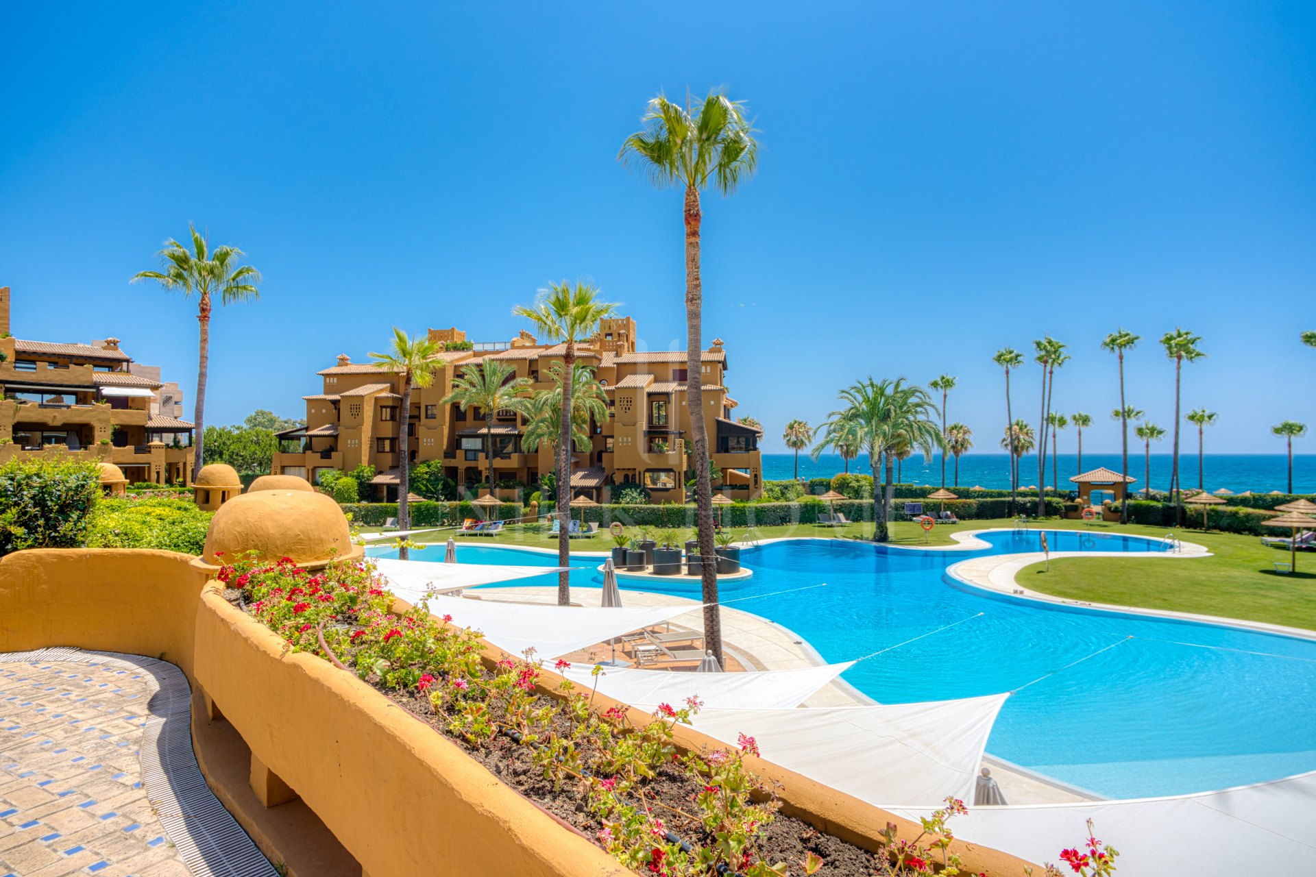 Beautiful beach front, south facing four bedroom apartment located in Los Granados del Mar on the New Golden Mile