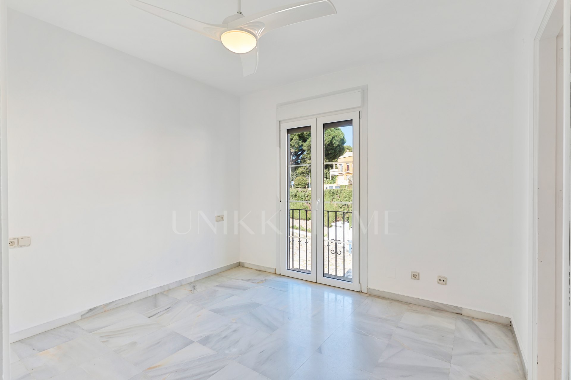 South-facing four-bedroom townhouse located in the gated community of Montepiedra , Nagueles within the Golden Mile, Marbella