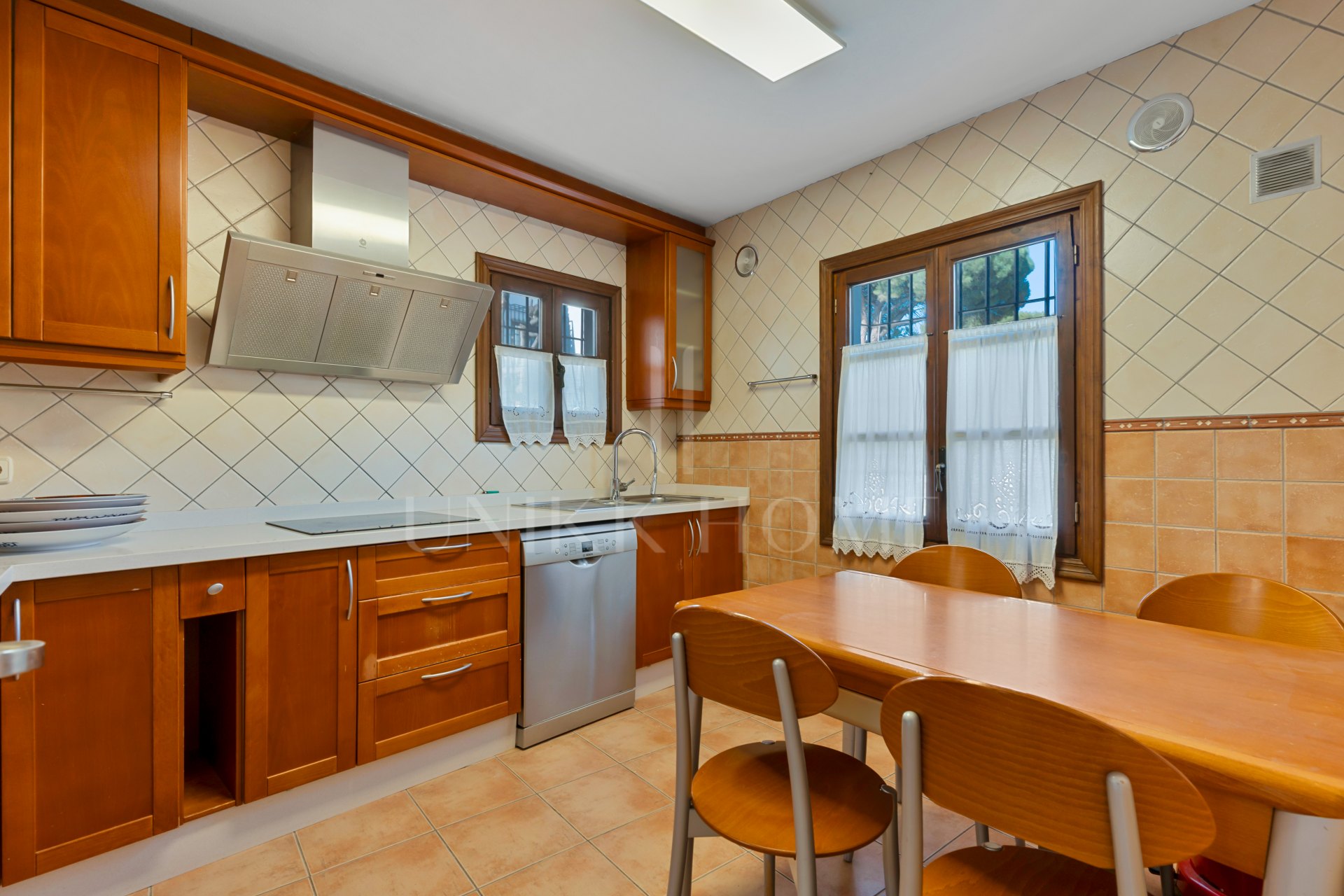 South-facing four-bedroom townhouse located in the gated community of Montepiedra , Nagueles within the Golden Mile, Marbella