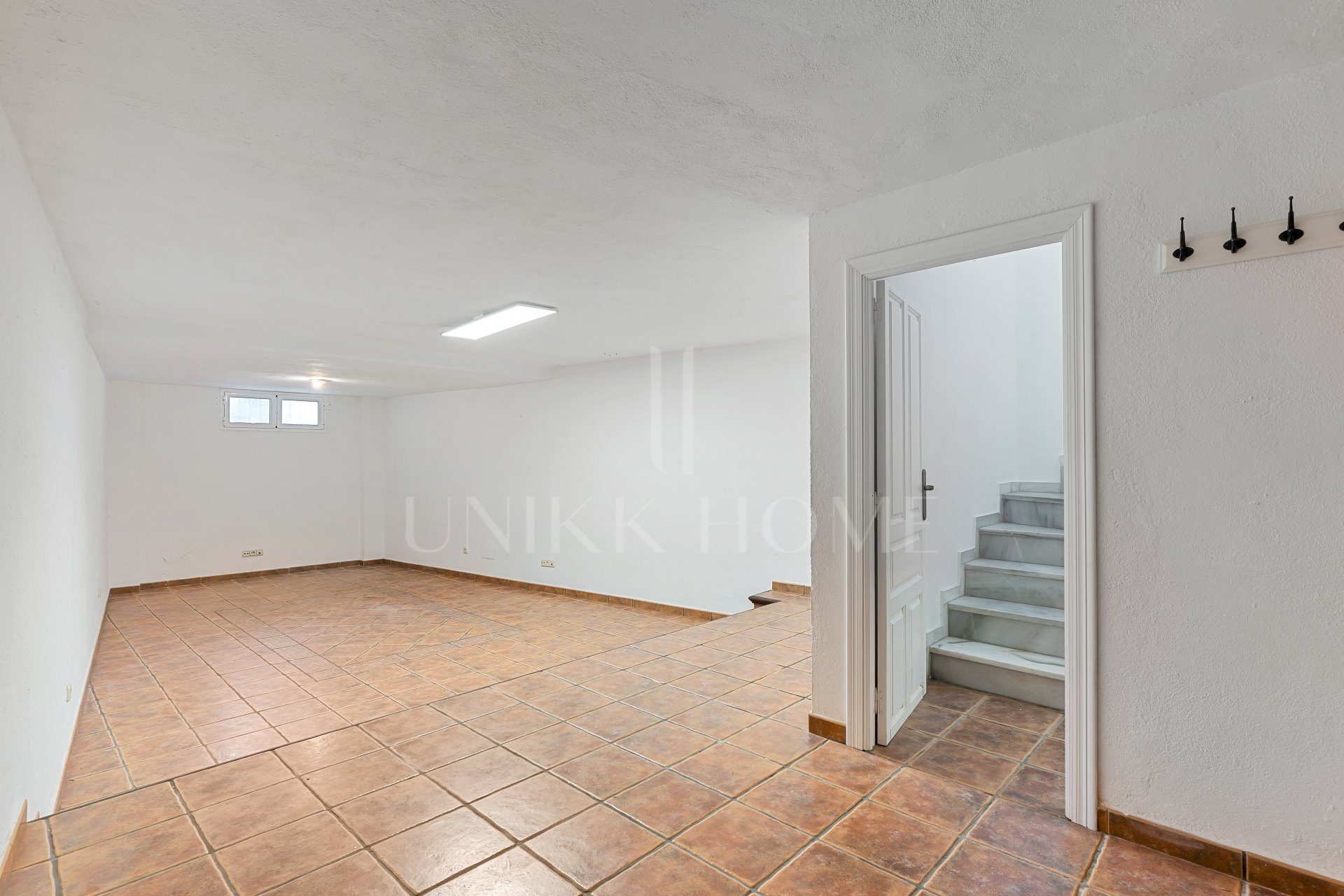 South-facing four-bedroom townhouse located in the gated community of Montepiedra , Nagueles within the Golden Mile, Marbella