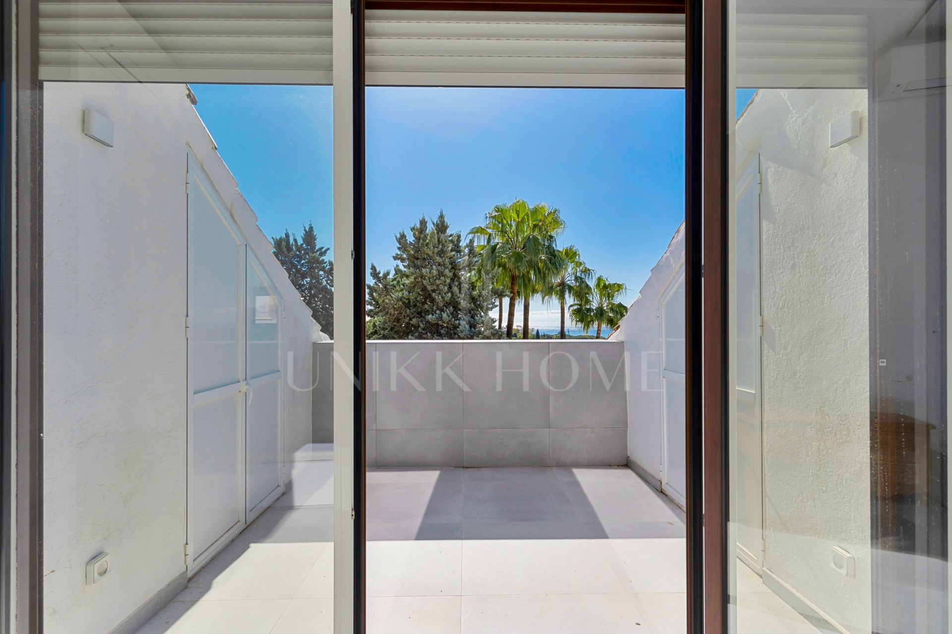 South-facing four-bedroom townhouse located in the gated community of Montepiedra , Nagueles within the Golden Mile, Marbella