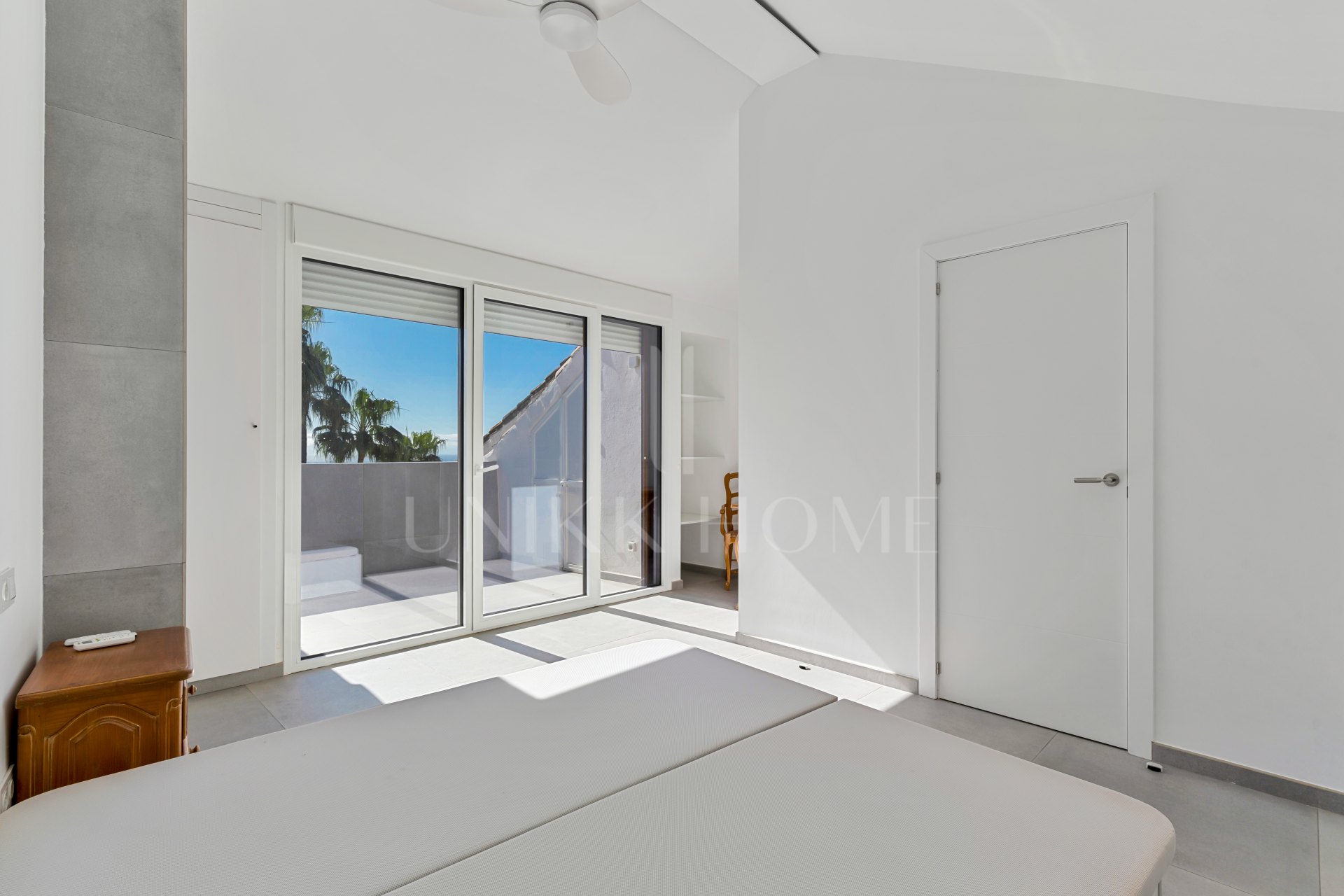 South-facing four-bedroom townhouse located in the gated community of Montepiedra , Nagueles within the Golden Mile, Marbella