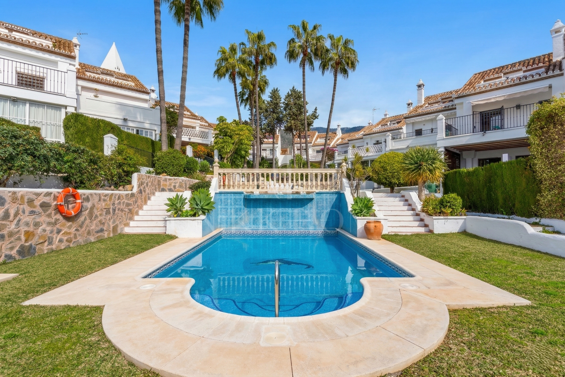 South-facing four-bedroom townhouse located in the gated community of Montepiedra , Nagueles within the Golden Mile, Marbella