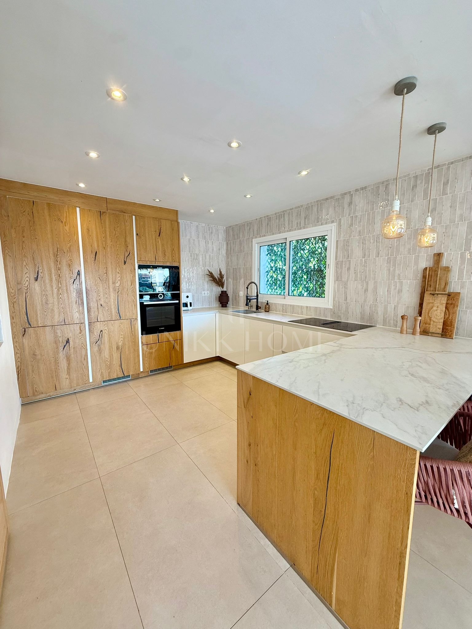 Beautifully renovated, south west facing three bedroom Villa located in Riviera del Sol, Mijas Costa with sea views