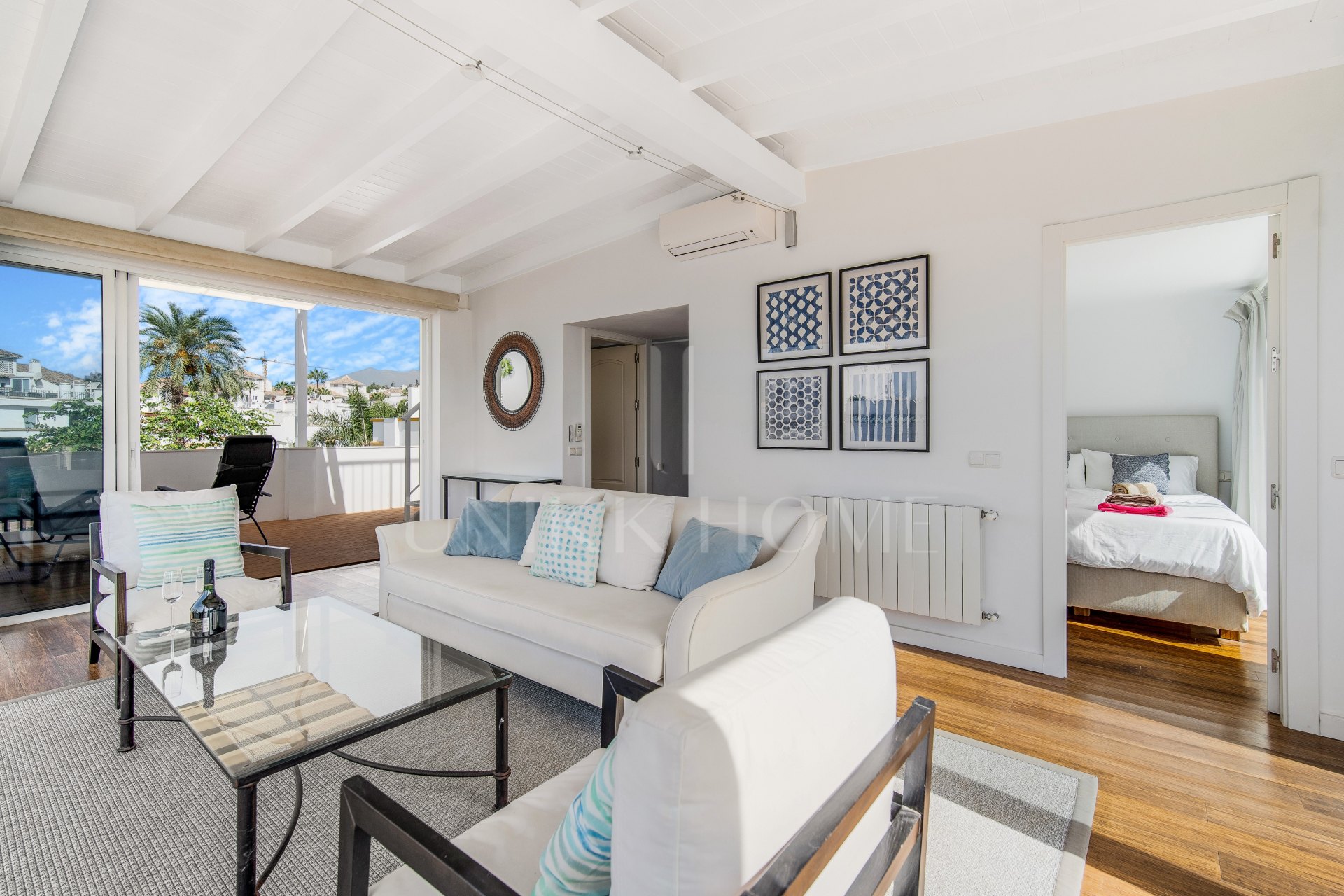 Beautiful frontline beach, four-bedroom end townhouse in the prestigious community of Marbellamar, on Marbella Golden Mile