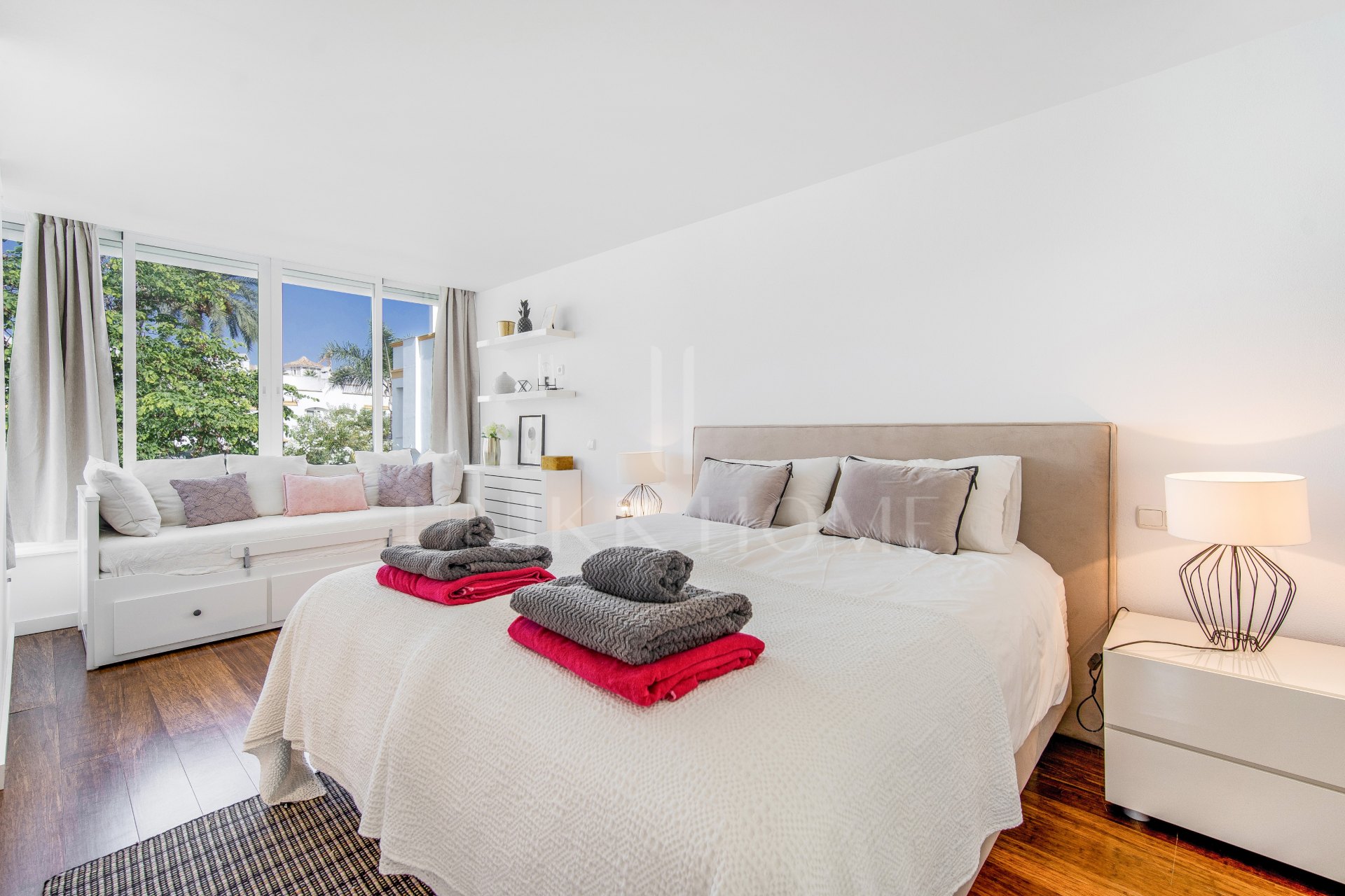 Beautiful frontline beach, four-bedroom end townhouse in the prestigious community of Marbellamar, on Marbella Golden Mile
