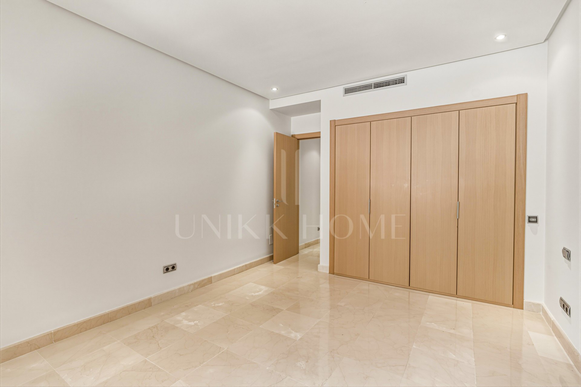 Beautiful, two bedroom, south facing ground floor apartment in the prestigious Mansion Club Marbella