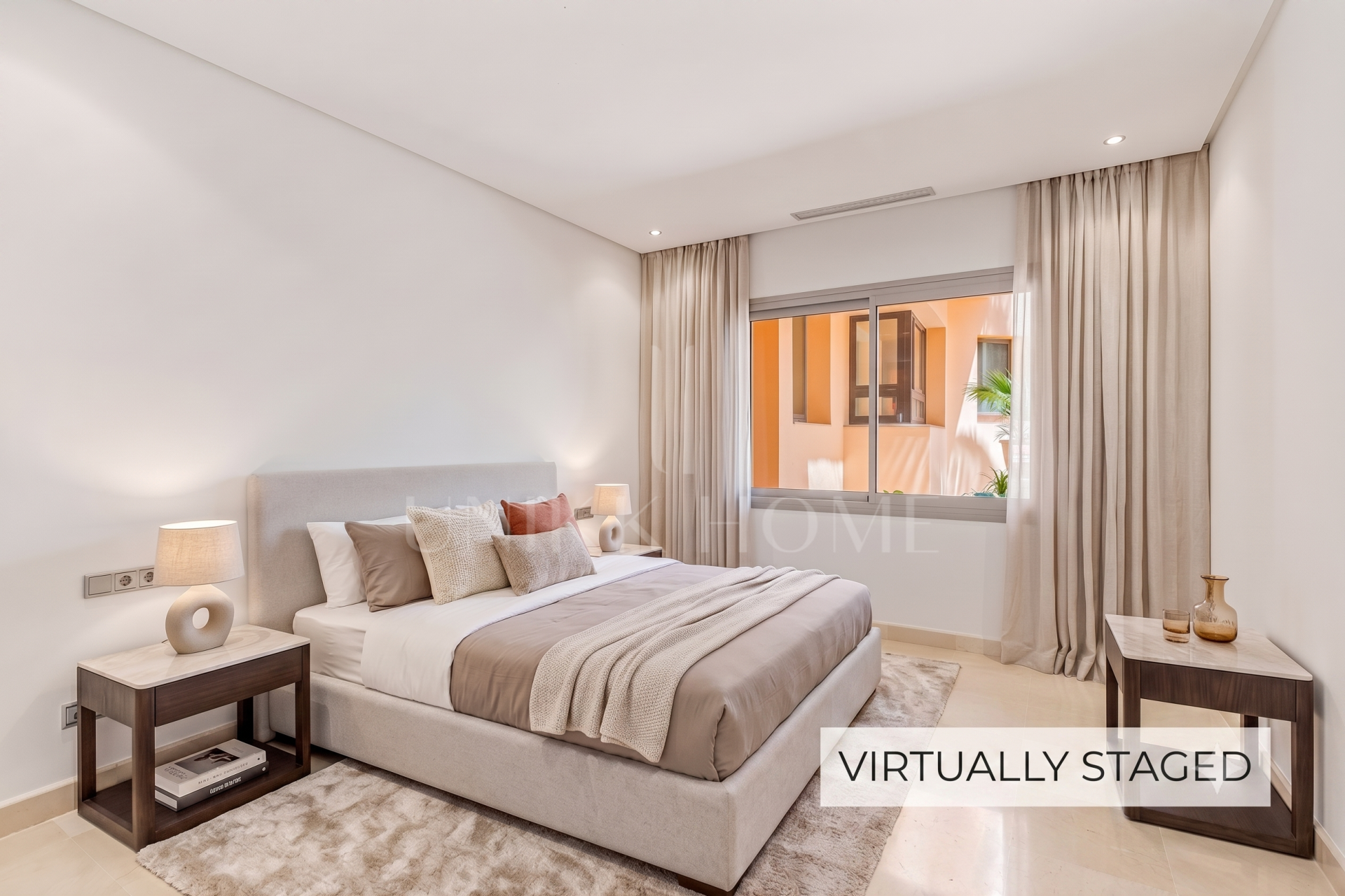 Beautiful, two bedroom, south facing ground floor apartment in the prestigious Mansion Club Marbella
