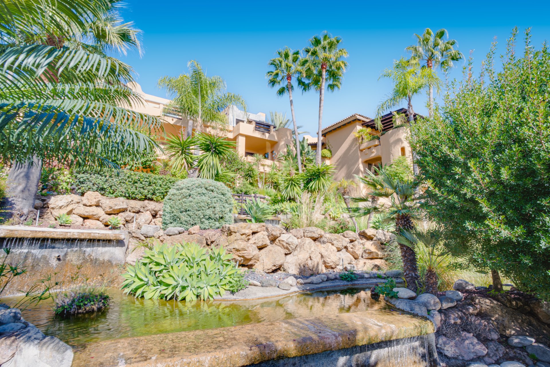 Beautiful, two bedroom, south facing ground floor apartment in the prestigious Mansion Club Marbella